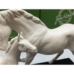 Five Beswick and Royal Doulton horse figures in matt white on black plinths, comprising of  Spirit of Affection no. 2689/2536, Springtime no.2837, Spirit of peace no.2916, Spirit of earth no.2914 and Spirit of the wild no. 183, together with a composite figure of a horse (6)