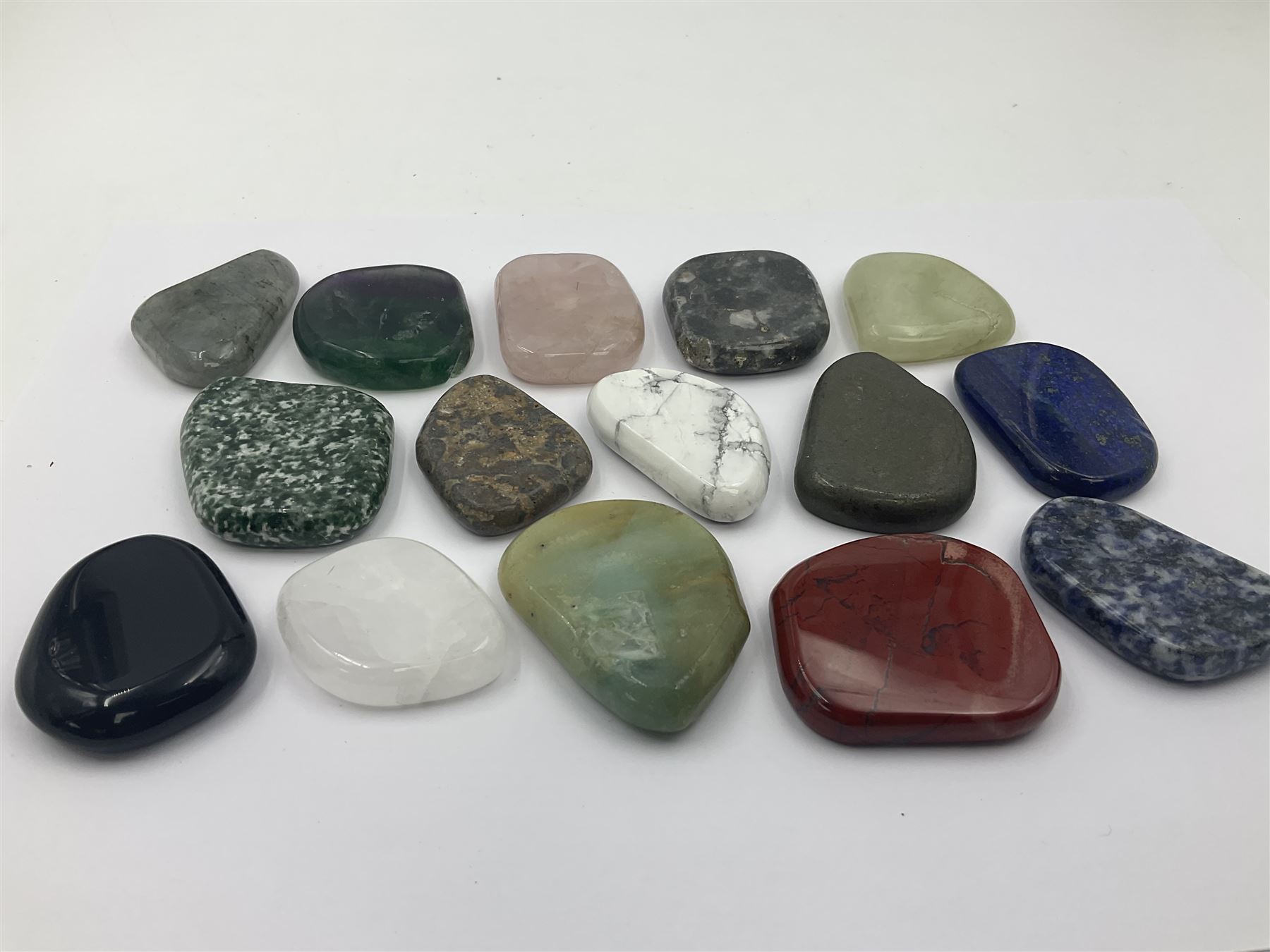 Fifteen mineral specimens, each cut and polished to highlight natural formations, including lapis lazuli, rose quartz, green aventurine, jasper, black obsidian etc, L4cm