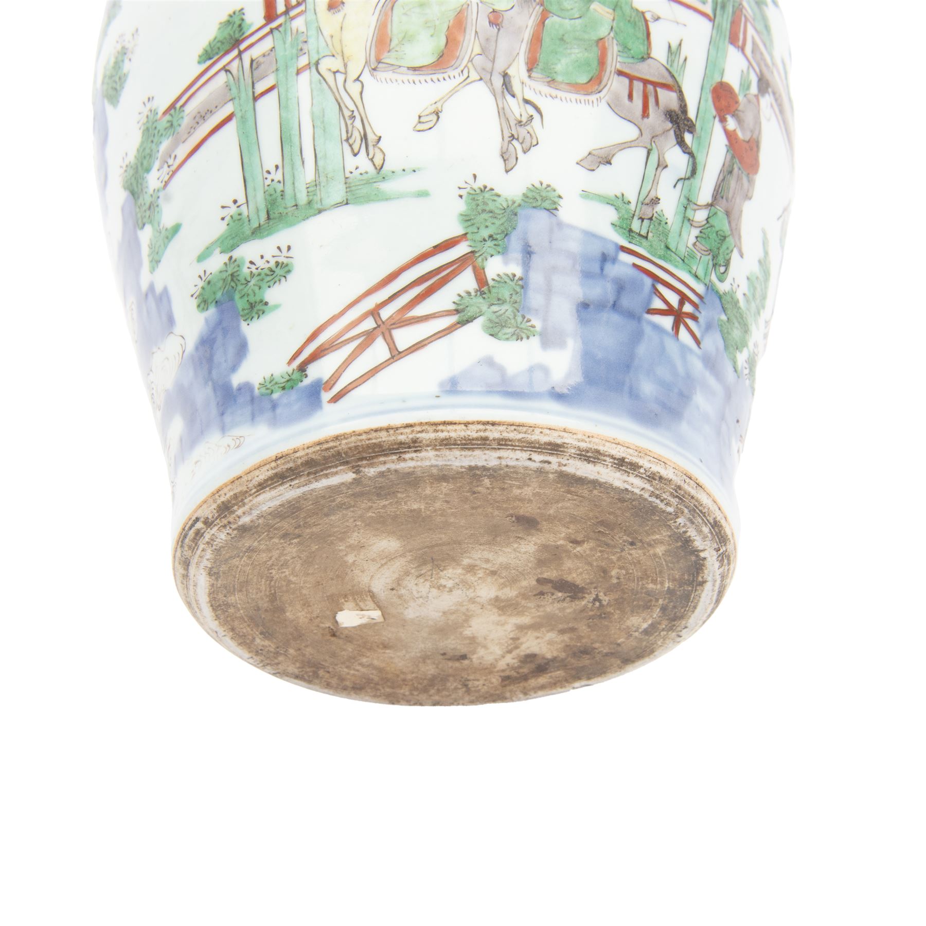 17th century Transitional period Chinese Wucai vase and cover, of baluster form, the body painted with ladies upon a terrace, and figures upon horseback and attendants within a fenced garden, the domed cover with knop finial painted with boys at play, H37cm
