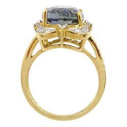18ct gold oval cut fancy colour tanzanite and round brilliant cut diamond cluster ring, hallmarked, tanzanite approx 9.00 carat