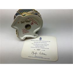 Two Royal Crown Derby paperweights, Dragon of Happiness, limited edition 1227/1500 and Dragon of Good Fortune, limited edition 1227/1500, both with gold stopper, hardwood base, certificate and with printed mark beneath