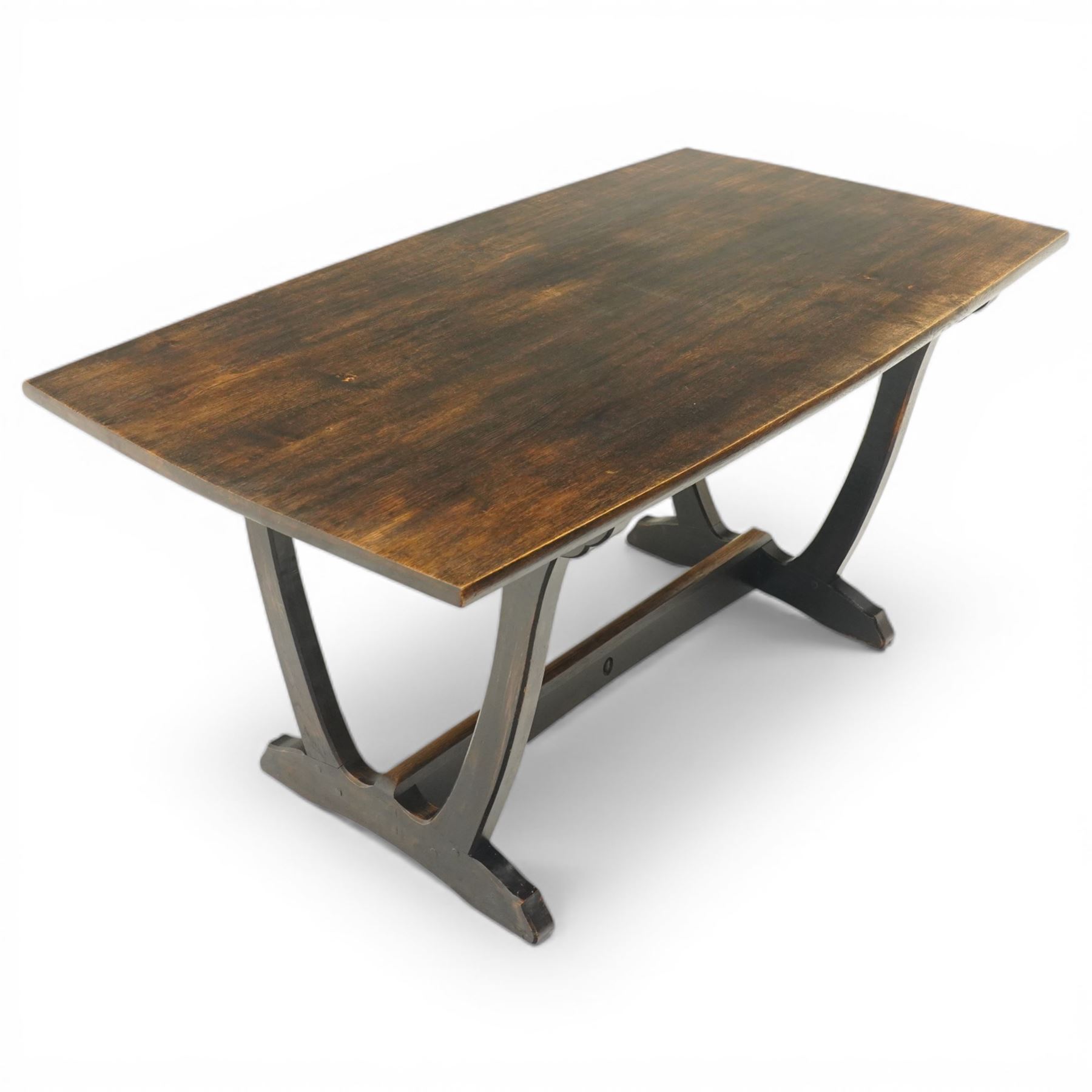 Acornman - dark stained oak dining table, rectangular top raised wishbone end supports united by stretcher, with carved acorn signature, by the workshop of Alan Grainger of Brandsby