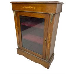 Victorian walnut pier cabinet, moulded rectangular top over inlaid frieze, enclosed by single glazed door, the uprights inlaid with extending stylised foliage decoration and cast gilt metal mounts, on moulded plinth base