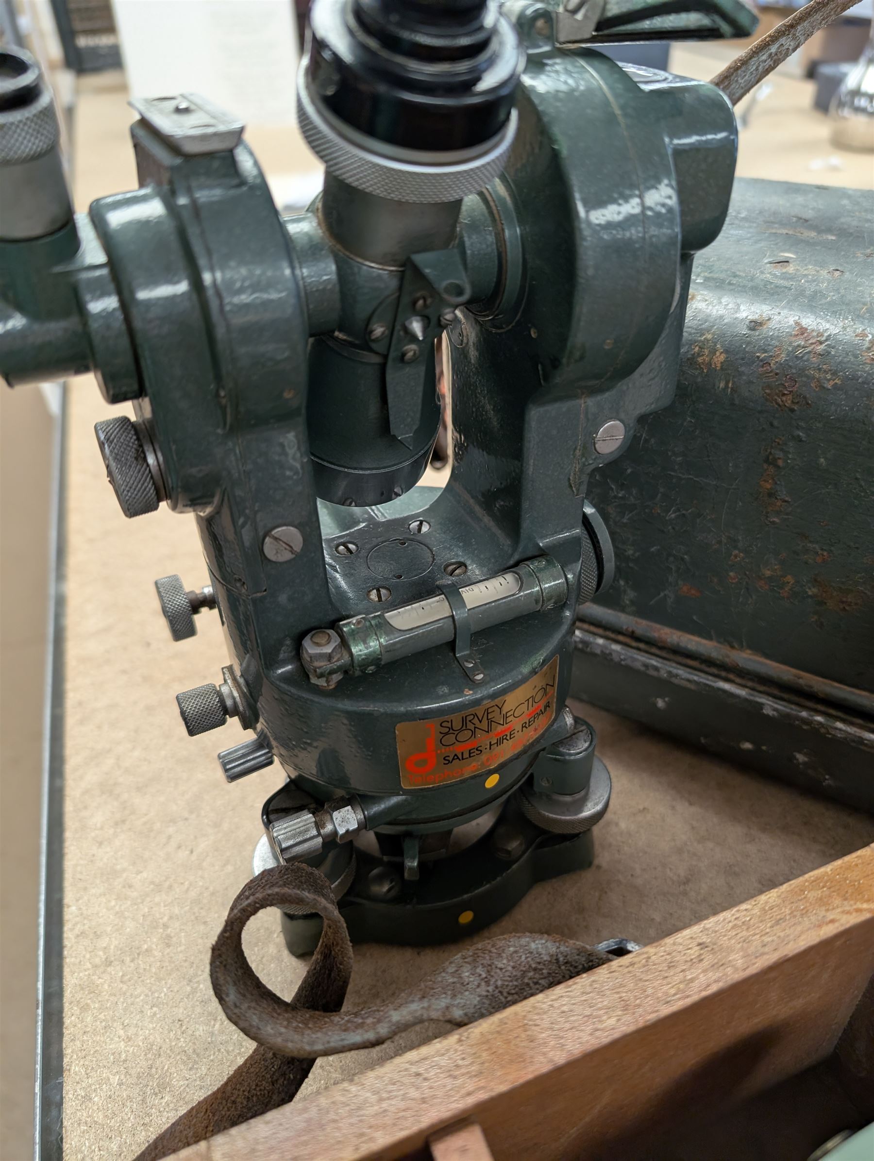 Two theodolites, comprising a Watts example in fitted hard case and a Cooke Troughton and Simms examplie in a wooden case, together with a Stanley dumpy level and a Hall and Watts surveyors measure