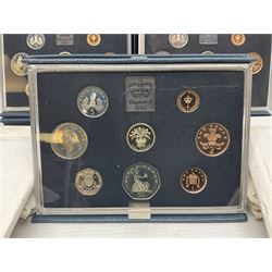 Five The Royal Mint United Kingdom 1984 proof coin sets, all cased with certificates, five Swaziland 1974 year sets and two Ceylon 1971 year sets (12)
