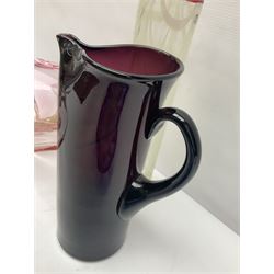 Two Whitefriars glass jugs, together with a Swedish Pukeberg art glass vase and three art glass bowls, including large pink example, some signed to base, tallest H30.5cm