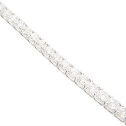 18ct white gold diamond bracelet, forty round brilliant cut diamonds , in a four claw setting, stamped 18K, total diamond weight 12.26 carat, with World Gemological Institute report