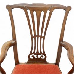 George III mahogany open elbow chair, shaped cresting rail over pierced splat, shaped arms with scroll carved terminals, drop-in seat upholstered in red fabric, on square supports with moulded edge united by plain stretchers 