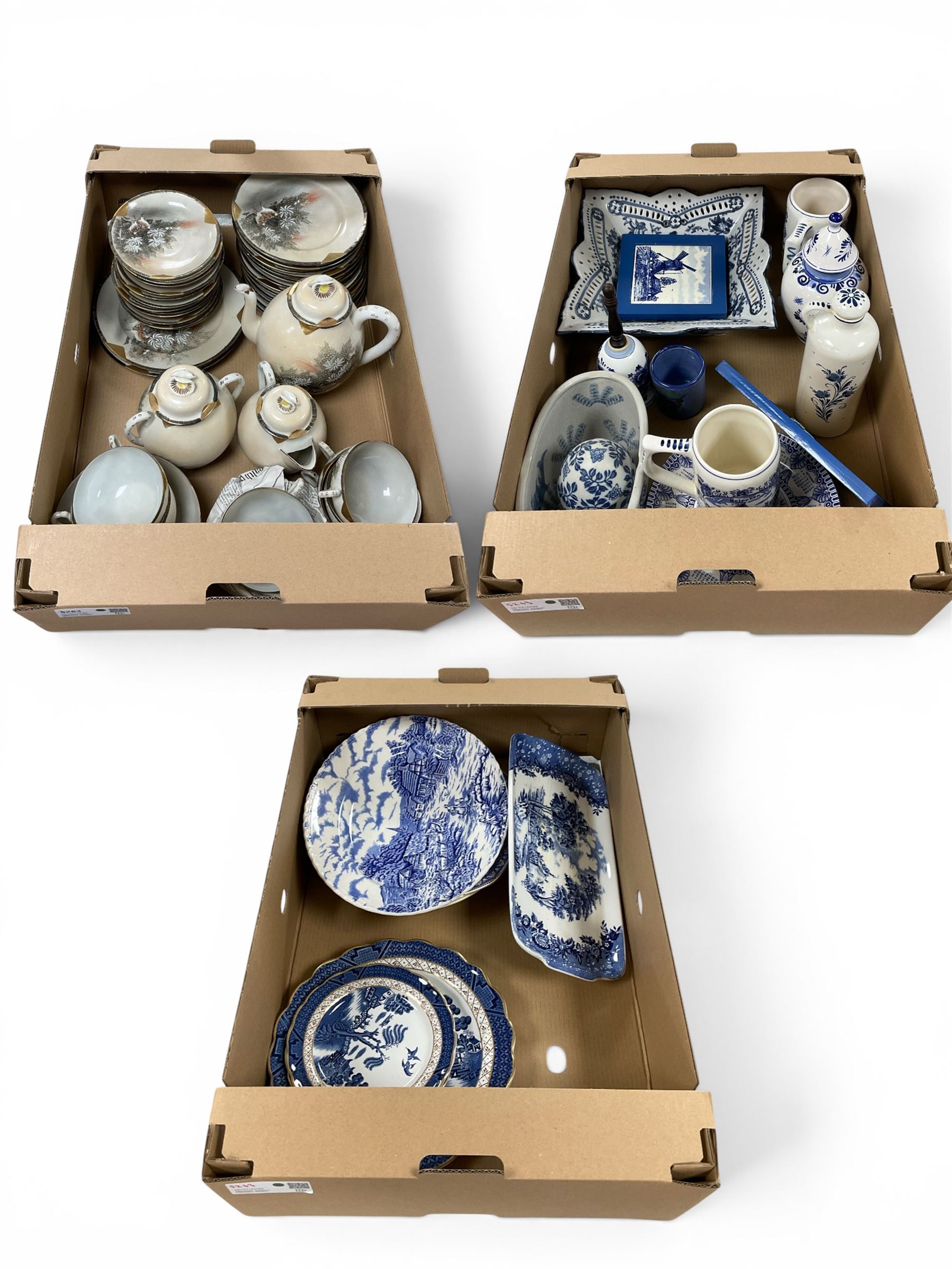 Collection of Japanese Kutani Eggshell tea service components, together with a large collection of blue and white ceramics including Heineken Delft Blue hand-painted tankard, Royal Goedewaagen Blue Delft decanter bottle and Elesva Holland jar