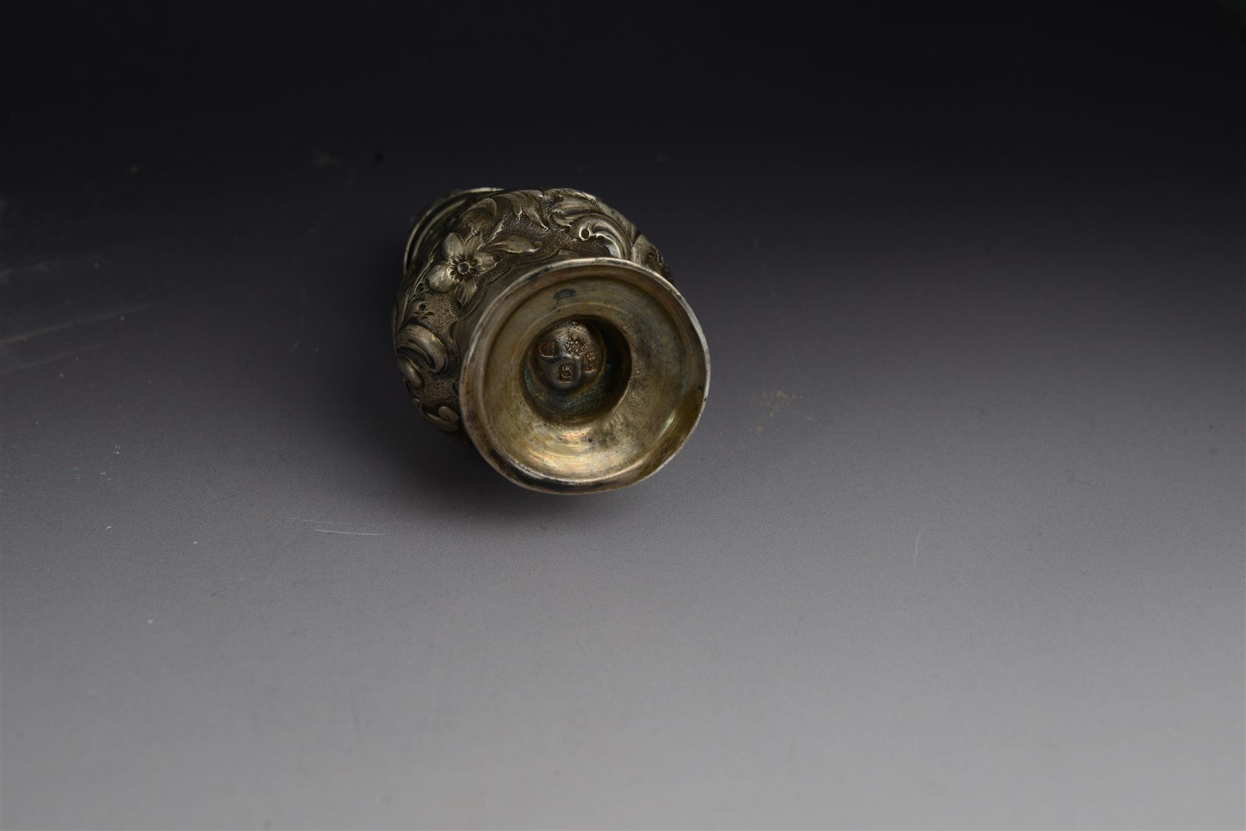 George III silver sugar caster, of typical form profusely embossed with floral and foliate details, hallmarked Jabez Daniell & James Mince, London 1768, H15cm
