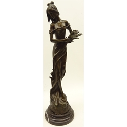  Bronze figure of a maiden collecting flowers after Jean Patou, signed, H53cm   