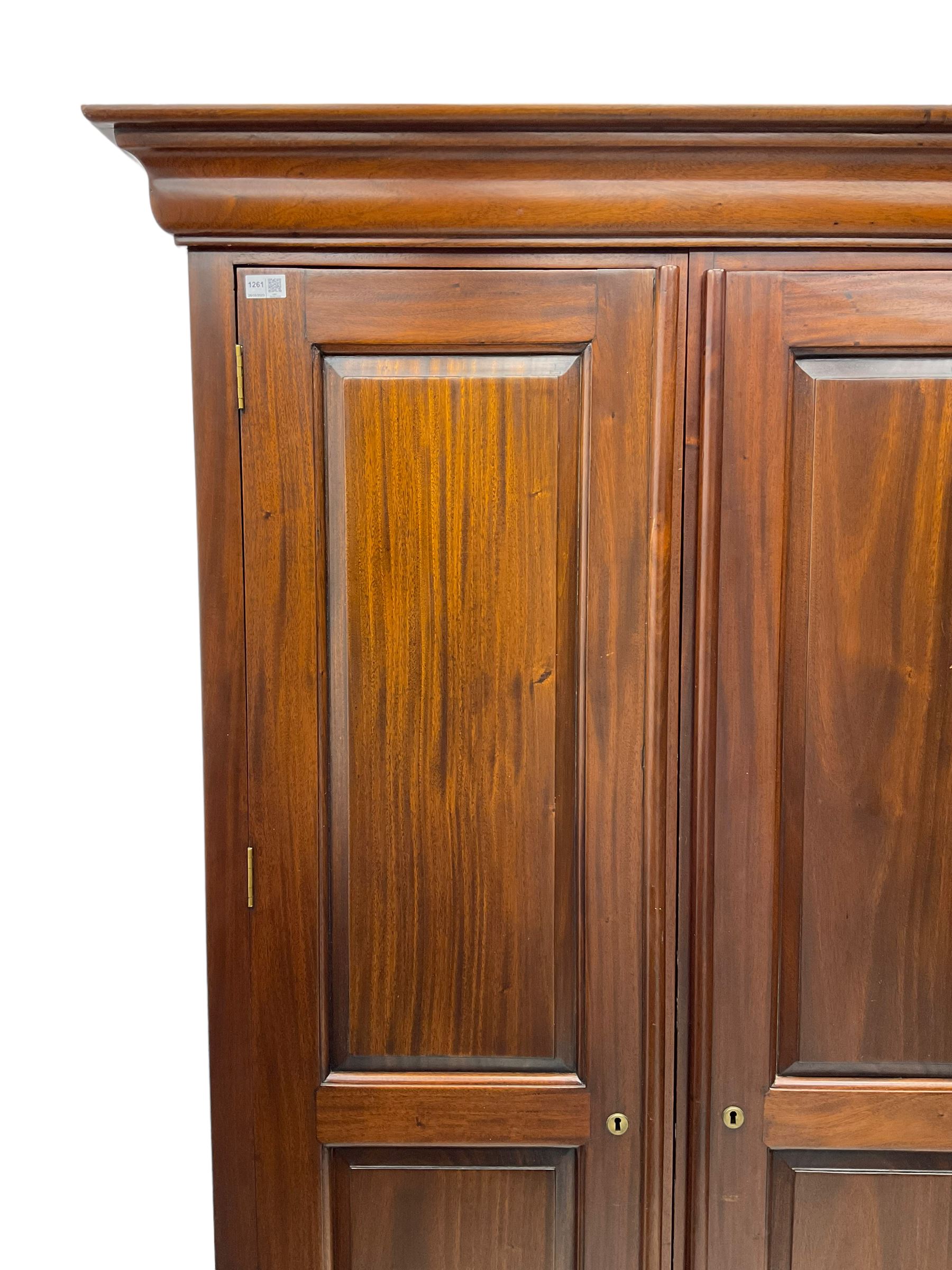 Barker & Stonehouse - 'Grosvenor' mahogany double wardrobe, projecting cornice over two panelled doors and panelled sides, on bracket feet