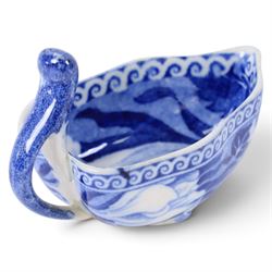 Early 19th century Spode butter boat, of leaf shaped form with high curved open handle, transfer printed with flowers, H5cm L8cm