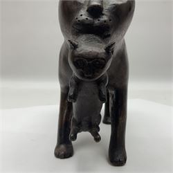 Folk Art wooden carving depicting a cat carrying a kitten, H16cm
