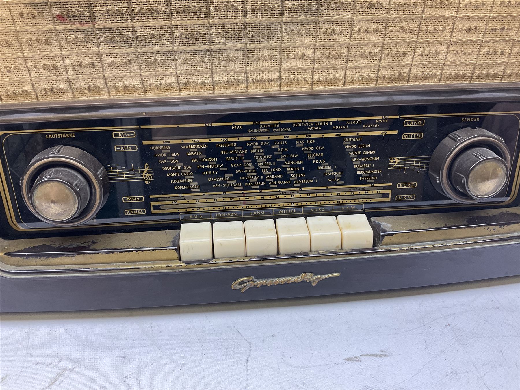 1950s Philips valve radio model B3G63A in brown Bakelite case, W42cm D21cm H30cm, together with 1950s Cossor Melody Maker model 524 radio and 1950s Grundig model 2041, tallest H35.5cm