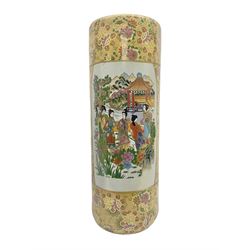 Modern Japanese ceramic umbrella stand, decorated with a figural panel on a yellow floral ground, H60cm
