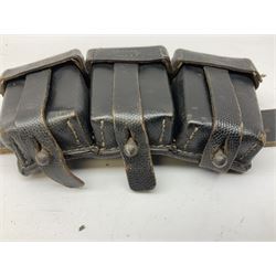 WW2 German 'SS' leather belt with six pouches (one containing unused field bandage) and buckle inscribed 'Meine Ehre Heifst Treue'; belt marked 0/0836 0029