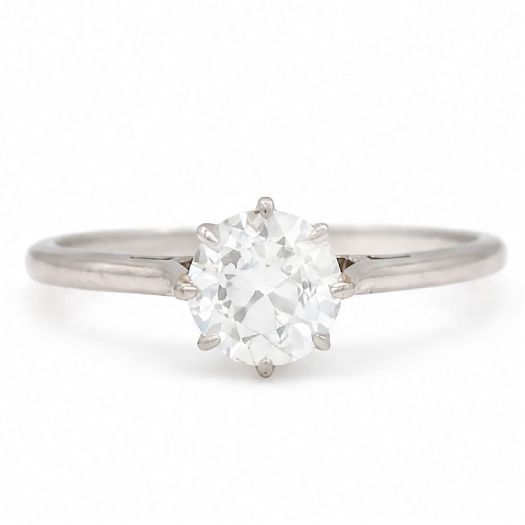 Early 20th century platinum diamond ring, single with a single old cut diamond of approx 0.85 carat, in tooled leather ring box