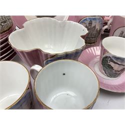 Group of 19th Century pink lustre souvenir wares, to include set of six Wright & Archibald Drapery Establishment teacups and saucers, together with jug, quatrefoil bowl and pierced edge plates, all stamped Made in Germany beneath, York Minster beaker and Clifton Suspension Bridge cup and saucer