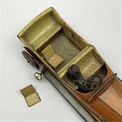 Early 20th century Lehmann clockwork tin-plate open top car with chauffeur, the bonnet inscribed 'Velleda', folding seats and bench seat to the back and integral key, various patent dates up to 1913, L25cm