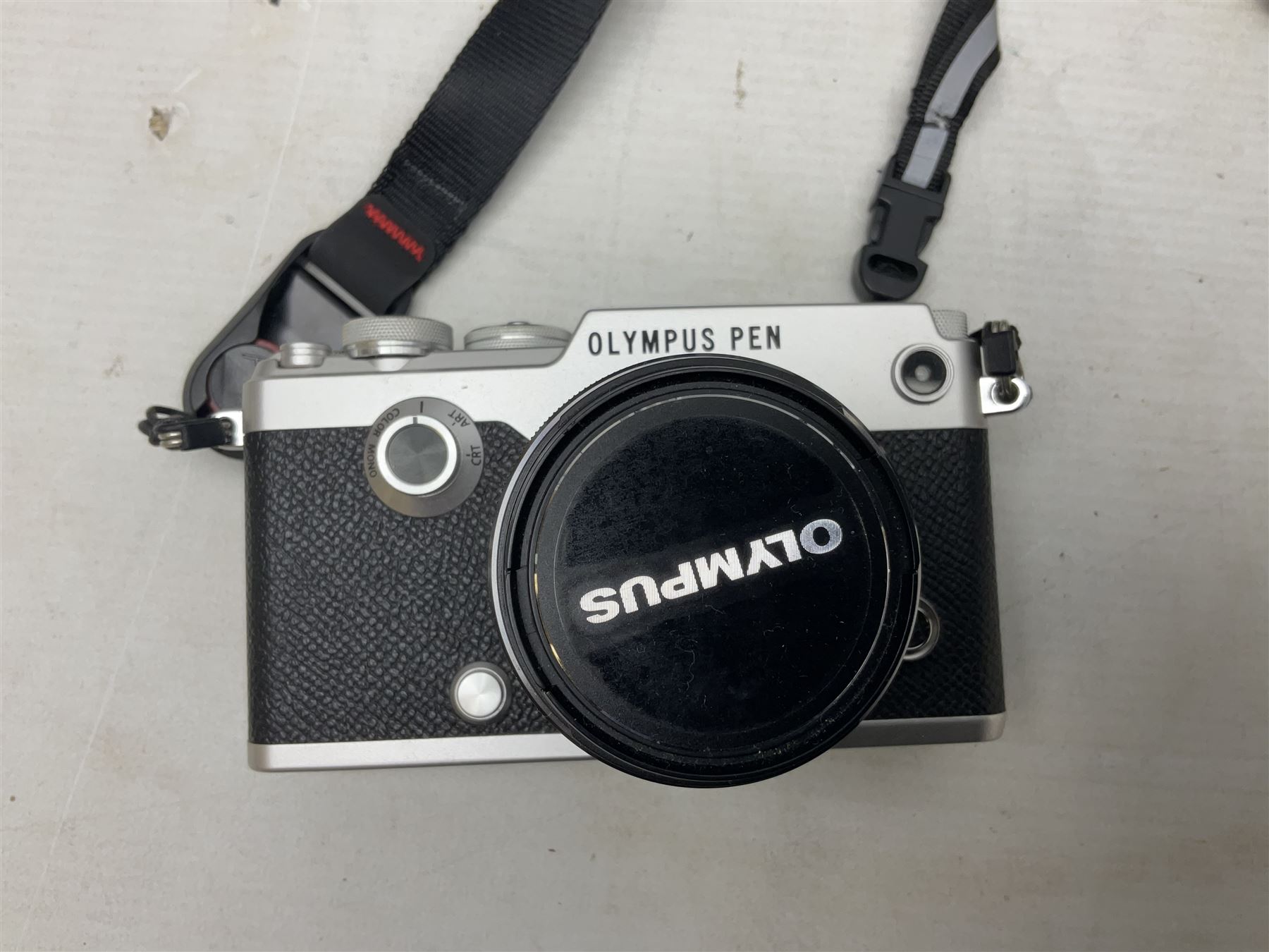 Olympus PEN-F camera body, with 'Olympus M- Zuiko Digital 25mm 1: 1.8' lens,  'Olympus M- Zuiko Digital 75-300mm 1: 4.8 - 6.7' lens and  'Olympus M- Zuiko Digital 17mm 1: 1.8' lens, with original box, together with Lowepro camera bag