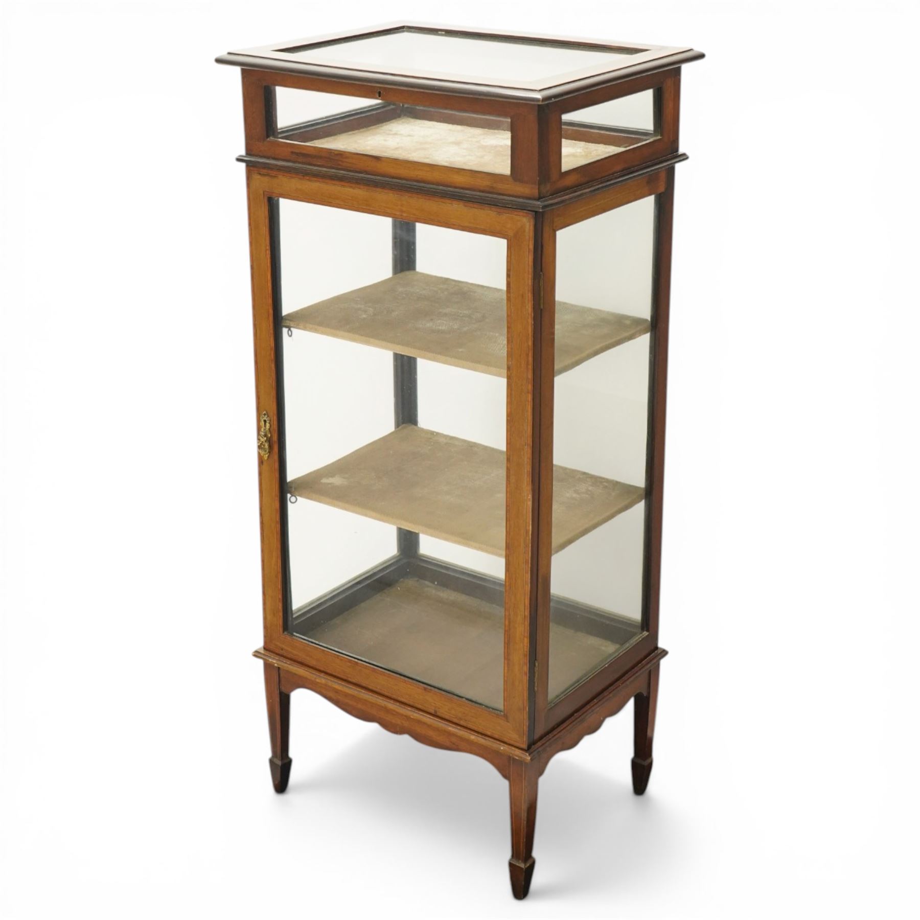 Edwardian inlaid mahogany glass cabinet with bijouterie upper section, four tier design with velvet lined interior shaped apron raised on spade feet