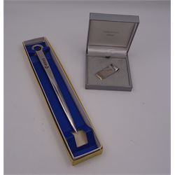 Modern silver letter opener with ring terminal, hallmarked Francis Howard Ltd, Sheffield 1977, L21.3cm, together with a modern silver money clip, of plain typical form, hallmarked W I Broadway & Co, Birmingham 2015, L5cm, each with maker's box, approximate total silver weight 2.45 ozt (76.2 grams)
