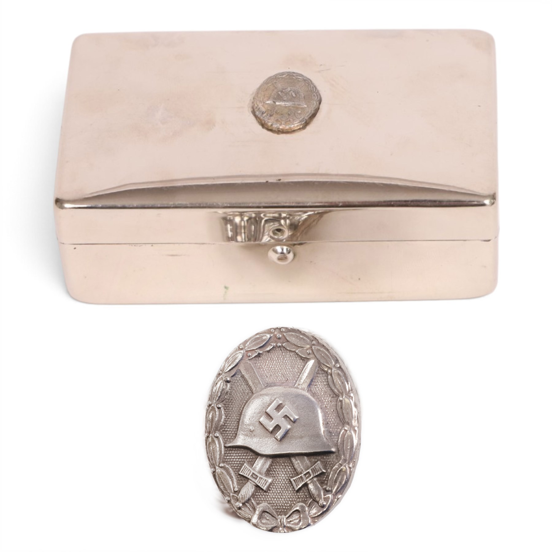 WWII German Third Reich 'silver' wound badge, numbered verso L22, together with a silver plate box with a miniature wound badge to the hinged lid, with brown velvet lining, box H3cm 