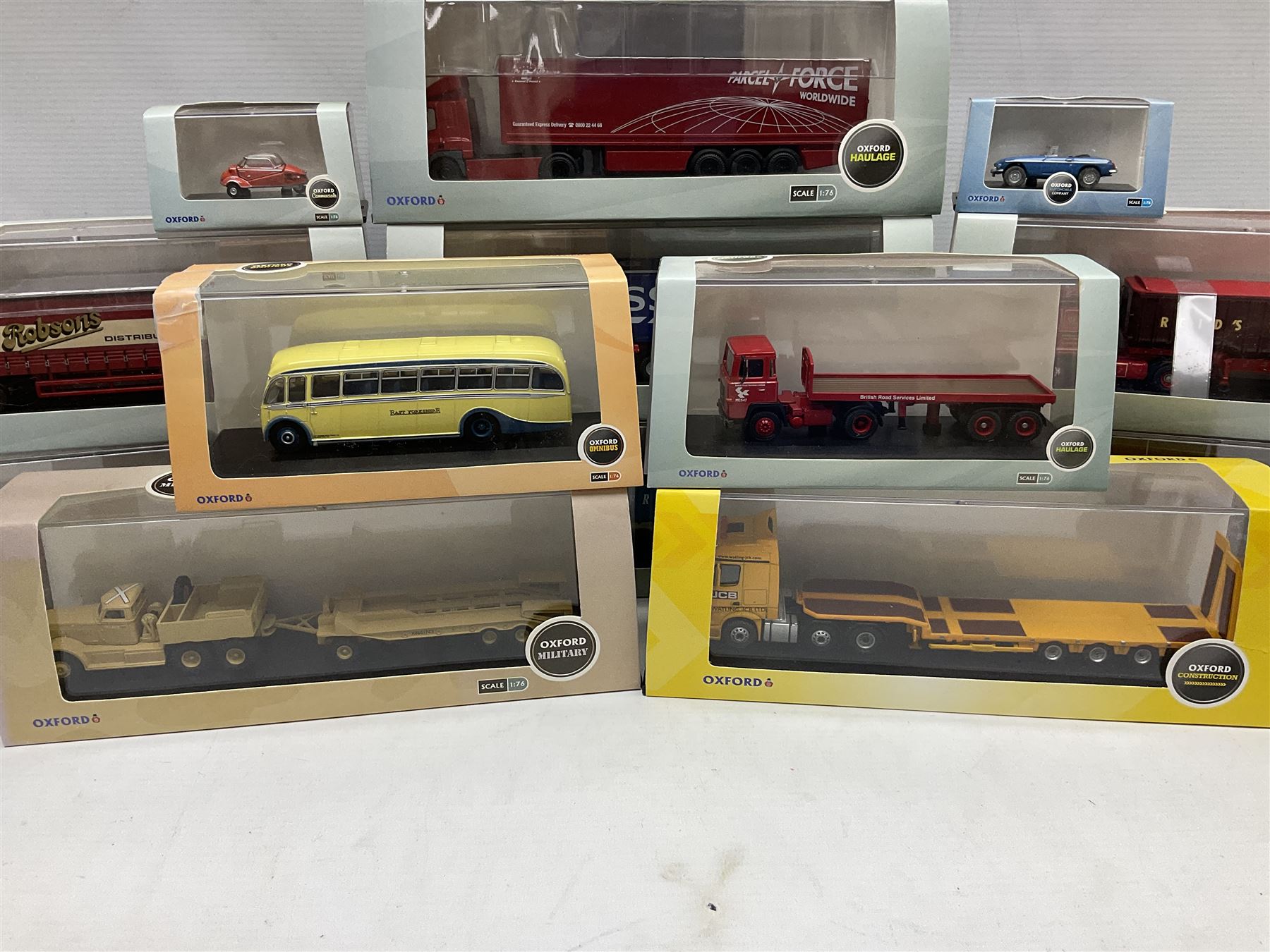 Twenty eight Oxford 1 76 scale die cast models including ten Haulage models one Construction four Commercials Chivers Sons Pollock Volvo British Road Services Military and others all boxed Toys Models