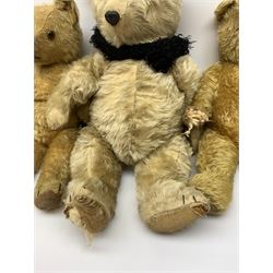 Four English teddy bears 1930s-50s including two by Chad Valley each with swivel jointed head, glass type eyes, horizontally stitched nose and mouth and jointed limbs H21