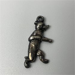 Bloodstone fob pendant, in a 9ct gold surround, soldered onto gold plated pendant mount, bloodstone seal, gold plated stone set stick pin and a silver dancing bear charm