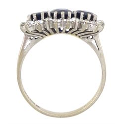 18ct white gold three stone oval and round cut sapphire and round brilliant cut diamond cluster ring, London 1986, total sapphire weight approx 1.80 carat, total diamond weight approx 0.60 carat