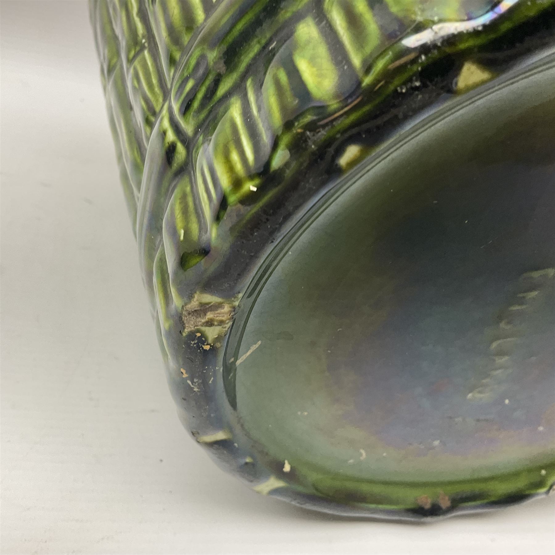 Jardiniere and stand, the jardiniere modelled as a pale, the stand with foliate and foliage decoration on a green ground, stand H73cm 