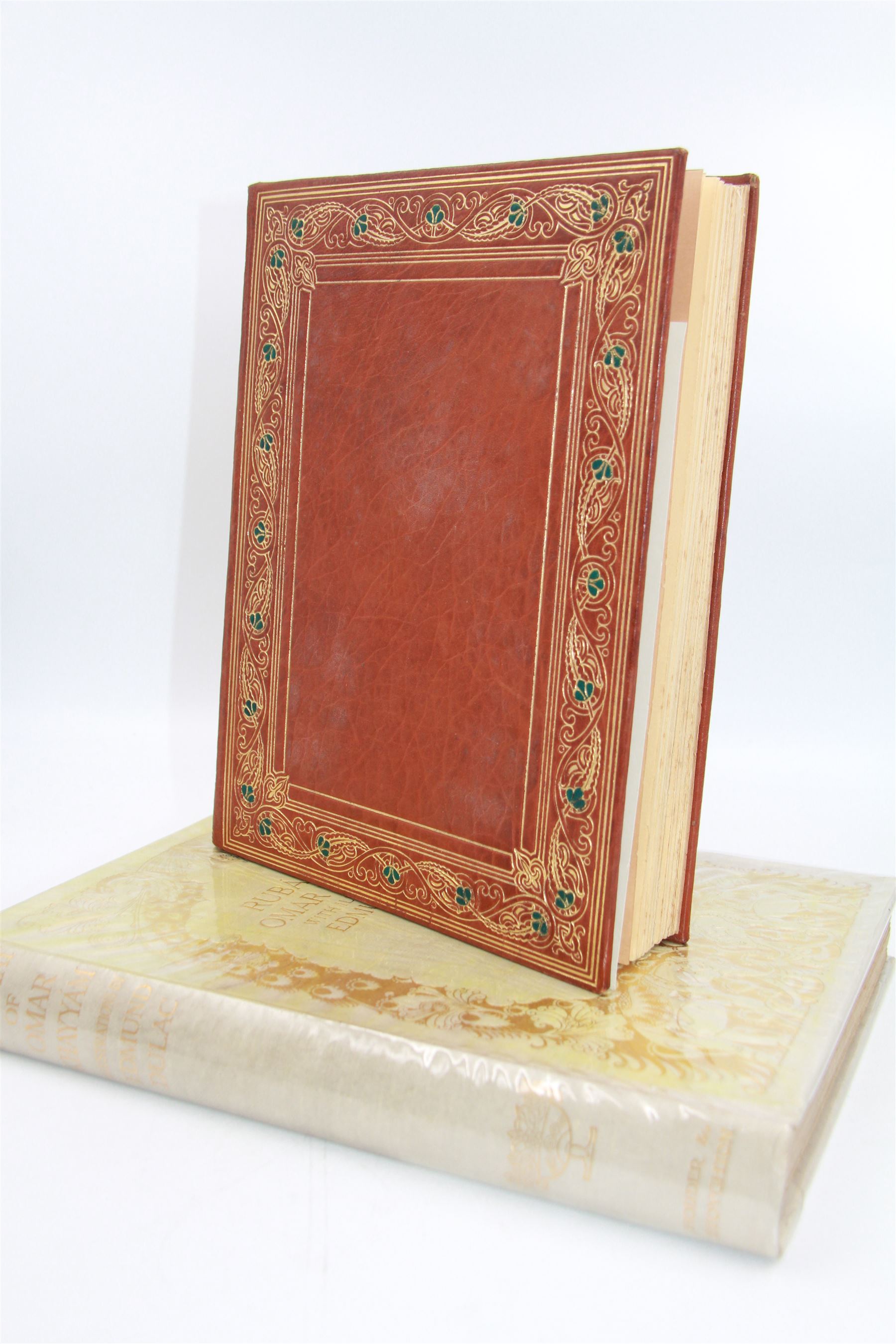 Rubaiyat of Omar Khayyam - two editions
Two editions of Fitzgerald, Edward (Translator) - 'Rubaiyat of Omar Khayyam', one with gilt leather coverer illustrated by Willy Pognay, the second illustrated by Edmund Dulac