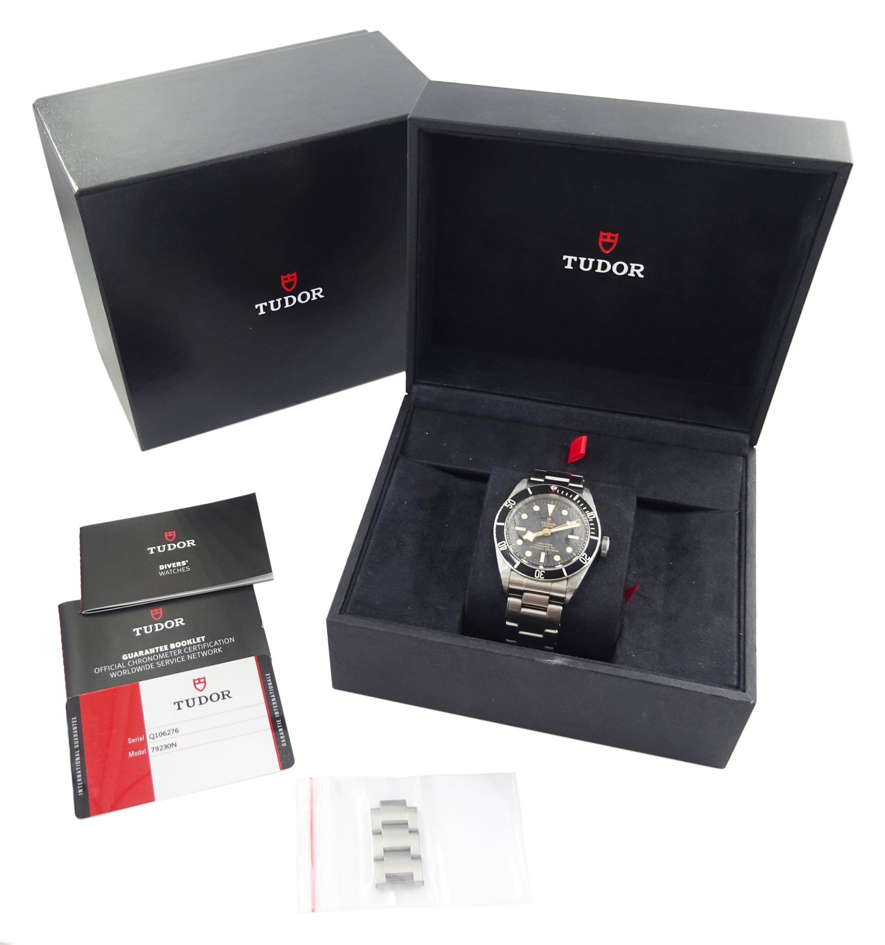 Tudor Black Bay Heritage gentleman's stainless steel automatic wristwatch, Ref. 79230N, serial No. Q106276, black dial with luminous dot and baton hour markers, on Tudor bracelet, with fold-over clasp, boxed with additional links and guarantee card dated 2019