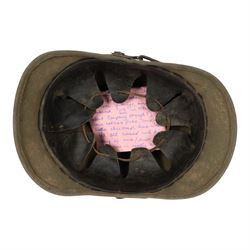 WWI Prussian 57th regiment Ersatz felt Pickelhaube, the grey felt skull with steel spike finial, stitched with green felt 57, chin strap, one side with a black cockade, the other black and red