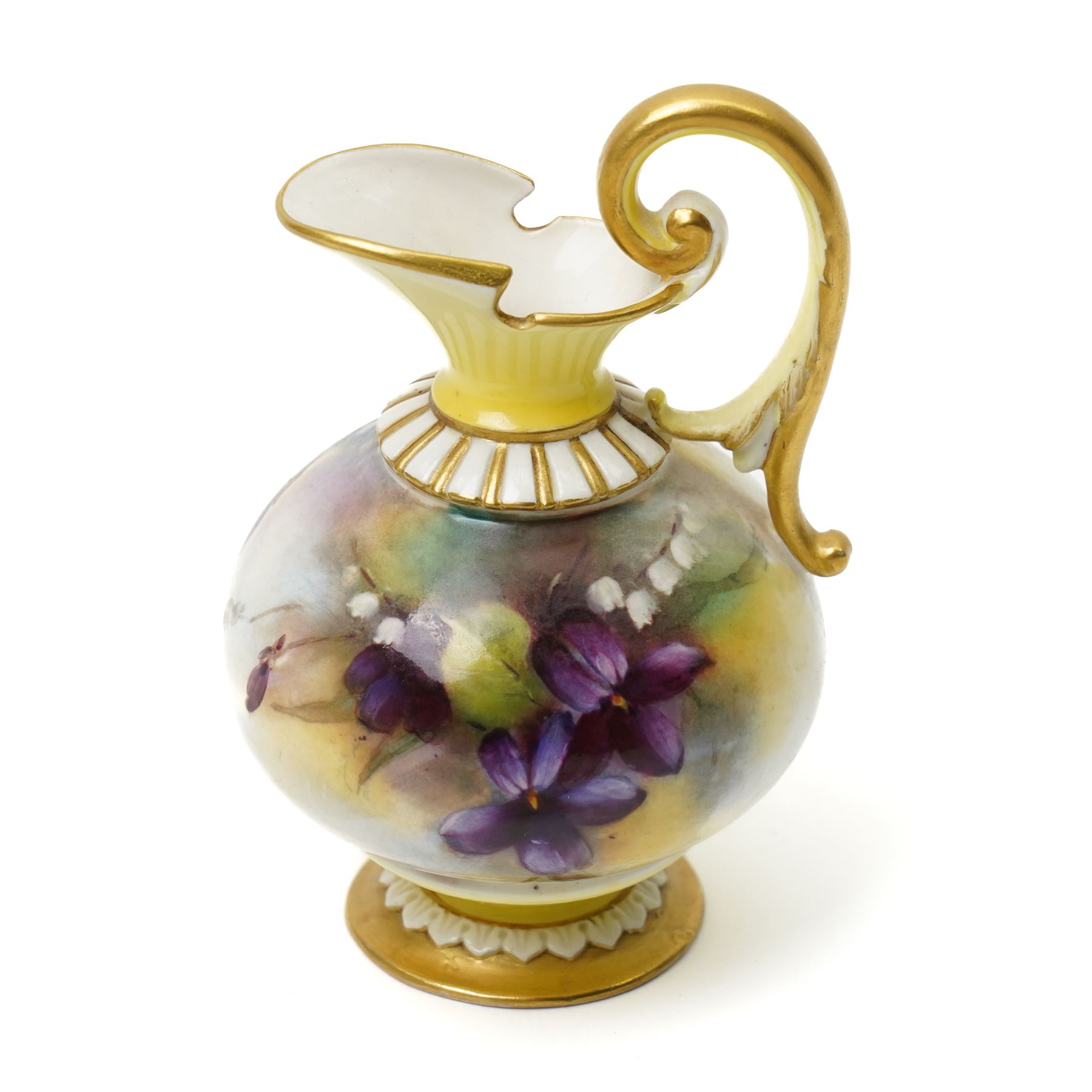 Nine hand-painted Royal Worcester items, comprising two trays painted with Worcester landscapes including 'Edgar Tower', a circular blush ivory tray painted with 'St Mary's Abbey - York', two trays and two covered trinket dishes painted with birds by Ernest Barker and H Powell, miniature jug painted by J Allen, and a Hadley Ware ewer, H11cm (9)