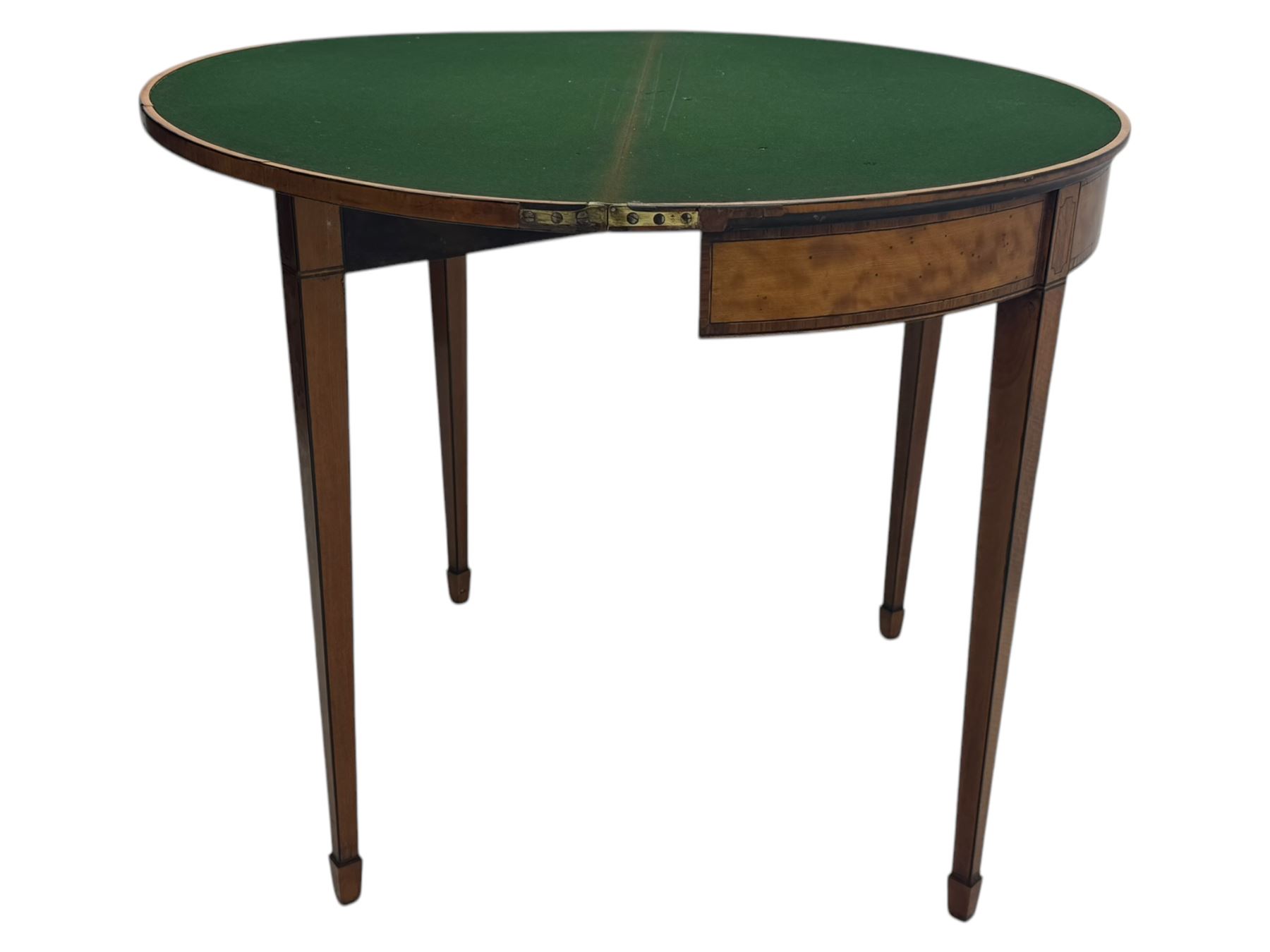 Edwardian satinwood inlaid demi-lune card table, hinged fold over green baize lined interior, raised on square tapered supports with spade feet  