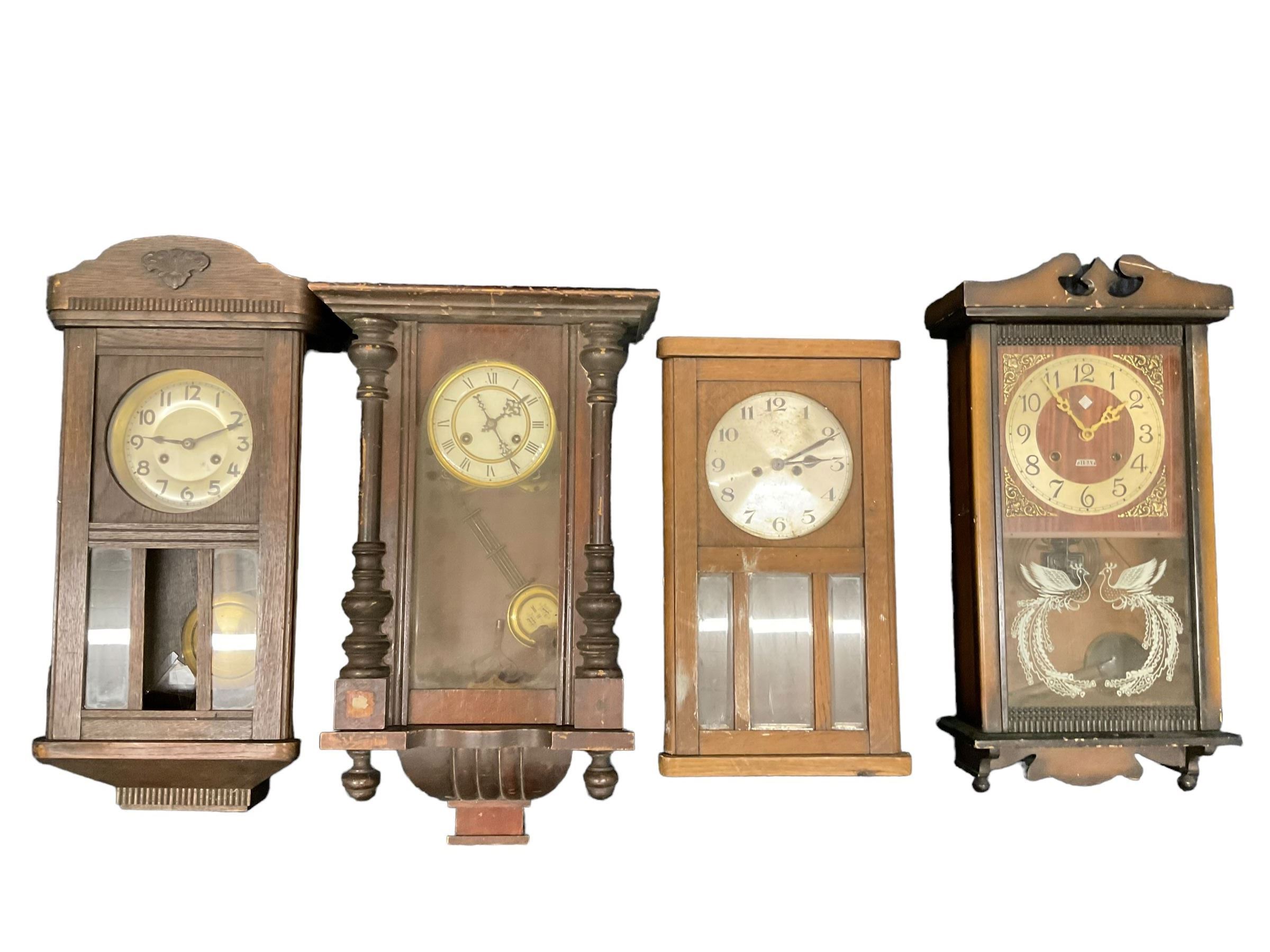 Four 20th century wall clocks