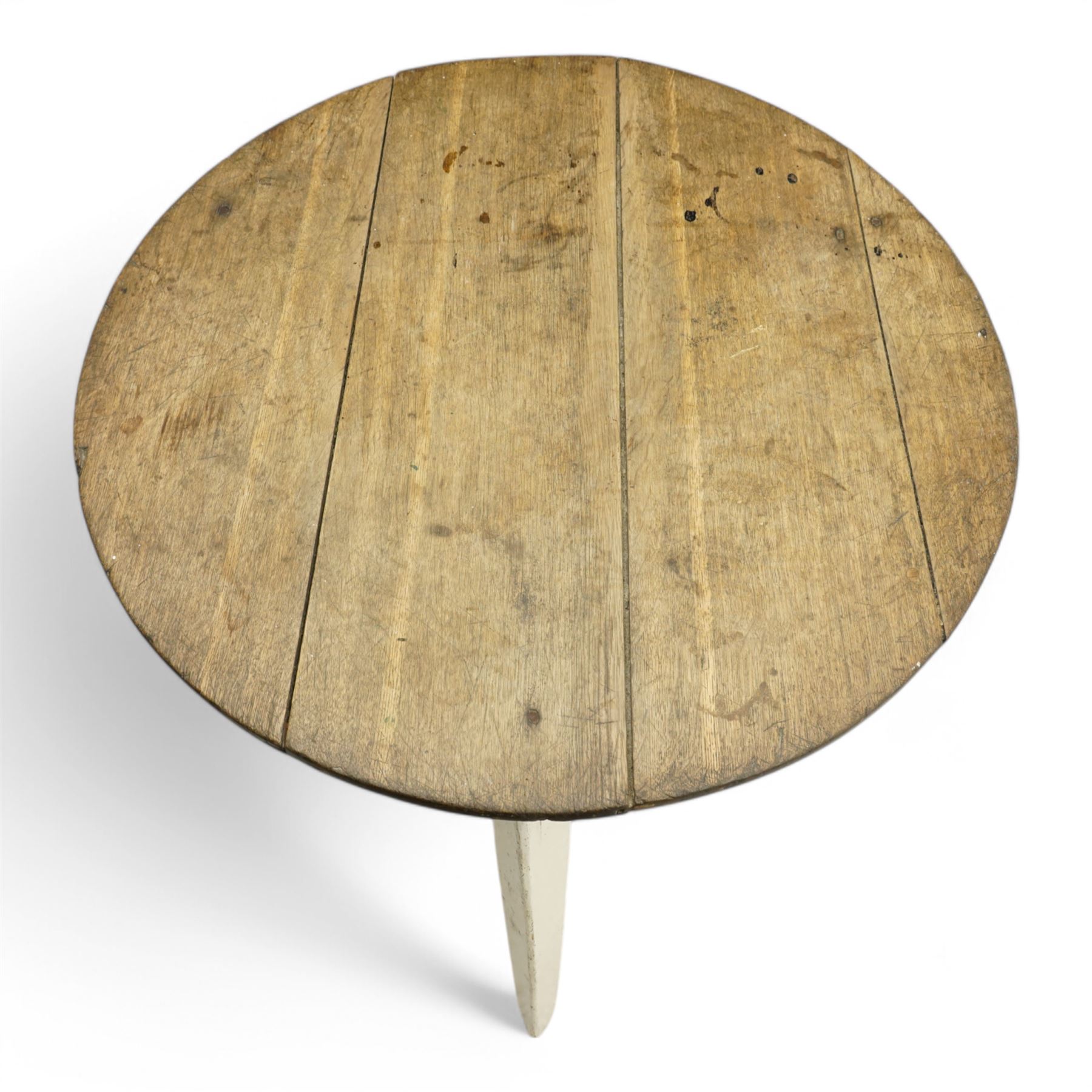 19th century oak and pine cricket table, circular plank top on painted base, tapering supports