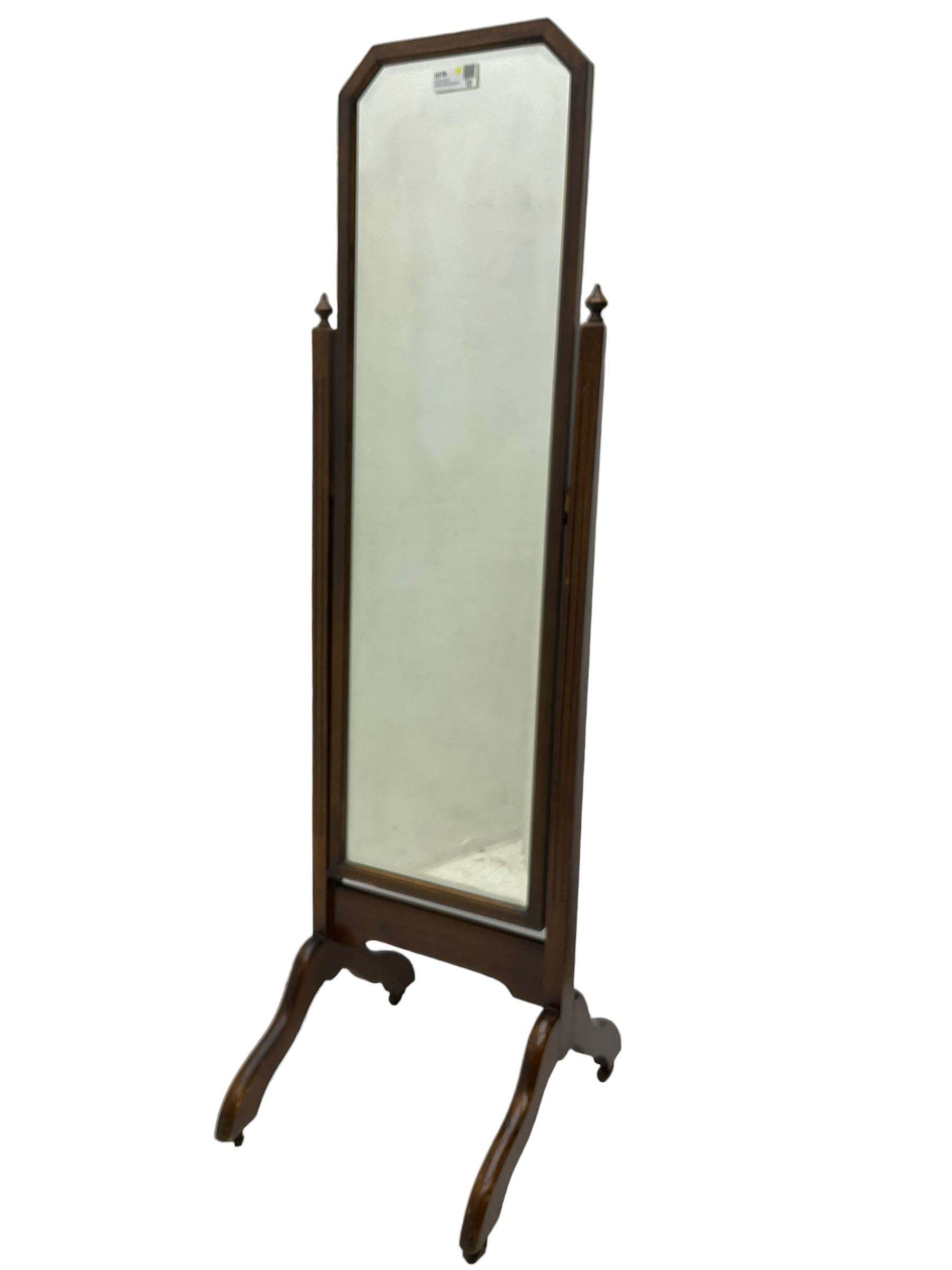 20th century mahogany framed cheval dressing mirror, rectangular bevelled plate with canted top corners, fluted uprights on splayed end supports and castors