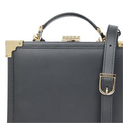 Aspinal of London black leather structured top-handle handbag with gold-tone metal mounts and corner protectors, the hinged lid opening to a fabric-lined interior fitted with a zip pocket and slip compartment, leather brand label stamped Aspinal of London England, fitted with a detachable adjustable leather shoulder strap, accompanied by an Aspinal of London dust bag and presentation box, W19cm D8cm H16cm