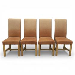 Modern large oak plank top dining table and twelve brown leather high back chairs, table of rustic construction five solid planks with exposed supports, the chairs in brown leather hide with ten standard height and a pair of taller chairs for the foot and head of the table