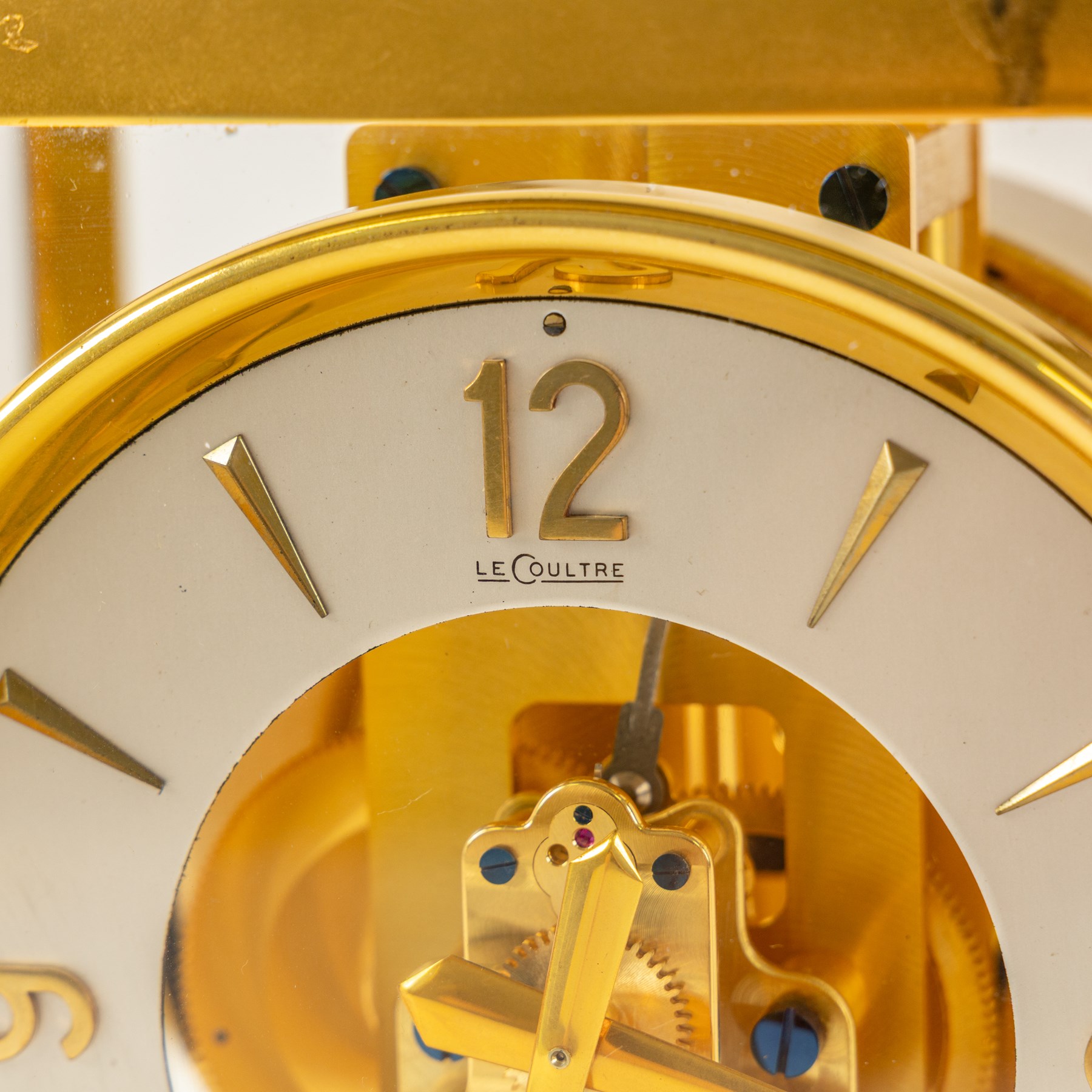 Jaeger-Le-Coultre, Atmos bracket clock, gilt brass case with glazed top and sides, silvered chapter ring with the numerals interspaced with batons, serial number 35125, H24cm