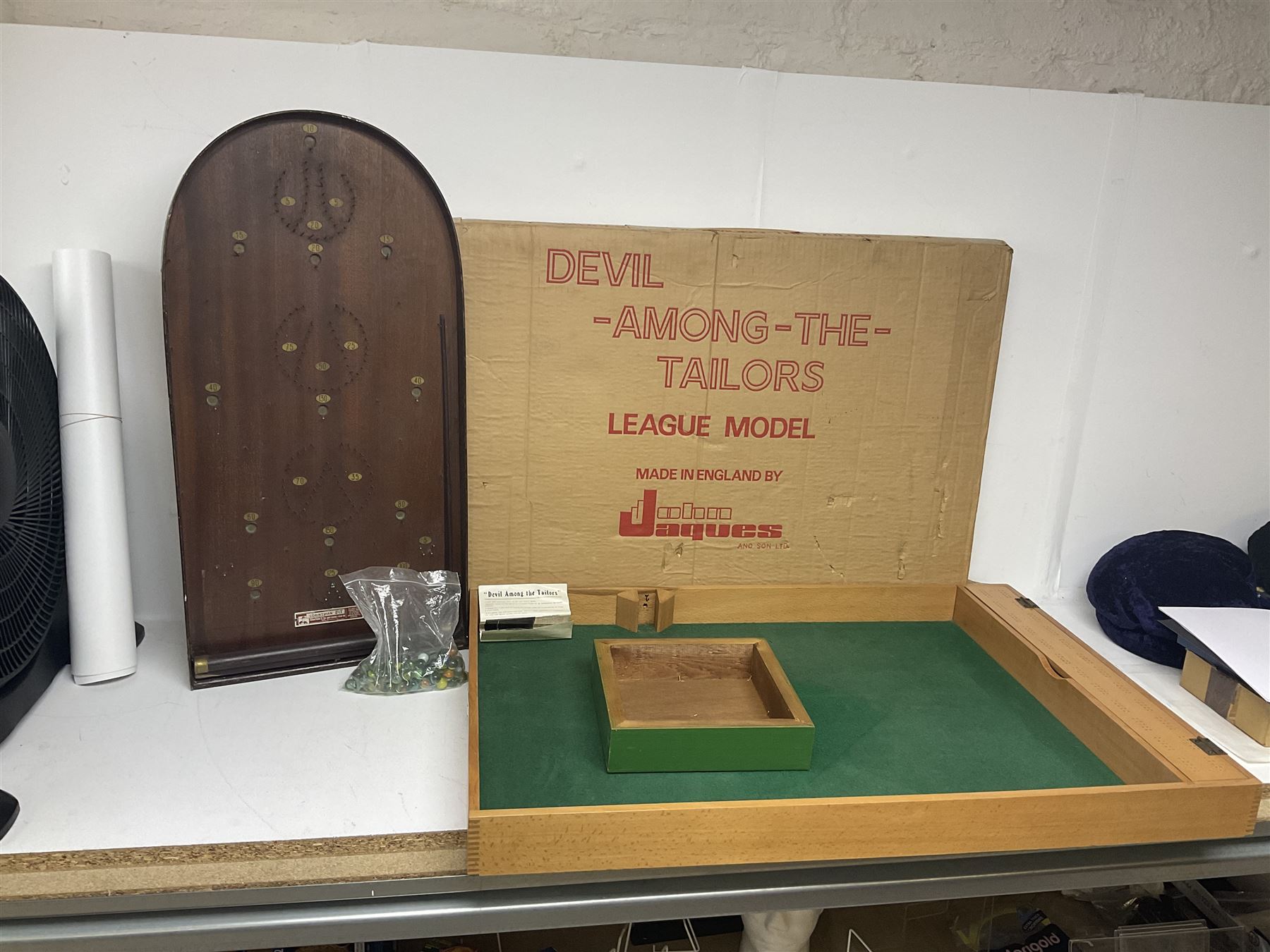 John Jaques and Son ‘Devil Among the Tailors’ wooden vintage skittles game, missing pole and ball, with instruction manual and original box; and a Corinthian Bagatelle board with marbles and push stick 