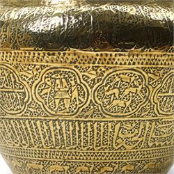  Islamic brass jardiniere  with all over engraving of figures, animals etc D31cm and a slightly smaller matching jardiliere D27cm 