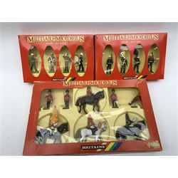Britains 'Metal-Models' series - nine sets/mounted soldiers comprising 7218 H.M. Queen Elizabeth set, 7233 H.M. Queen Elizabeth set, 7305 U.S. Marine Corps set, 7205 Three Mounted Life Guards, 7201 Royal Marine Colour Party, 7203 Royal Marine Drum & Bugle, 7249 Queens Colour Party, 7246 Lifeguard Standard Bearer and 7234 Royal Canadian Mounted Police; all boxed (9)