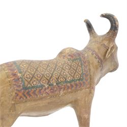 Pair of 19th century Indian hand painted Nandi bulls, H35cm