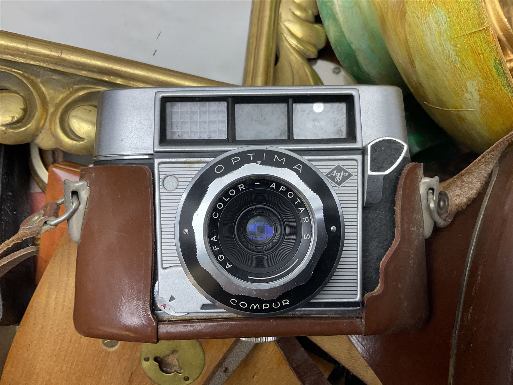 Onyx box with claw feet, together with gilt framed mirror, cut glass vase and other collectables, in three boxes 