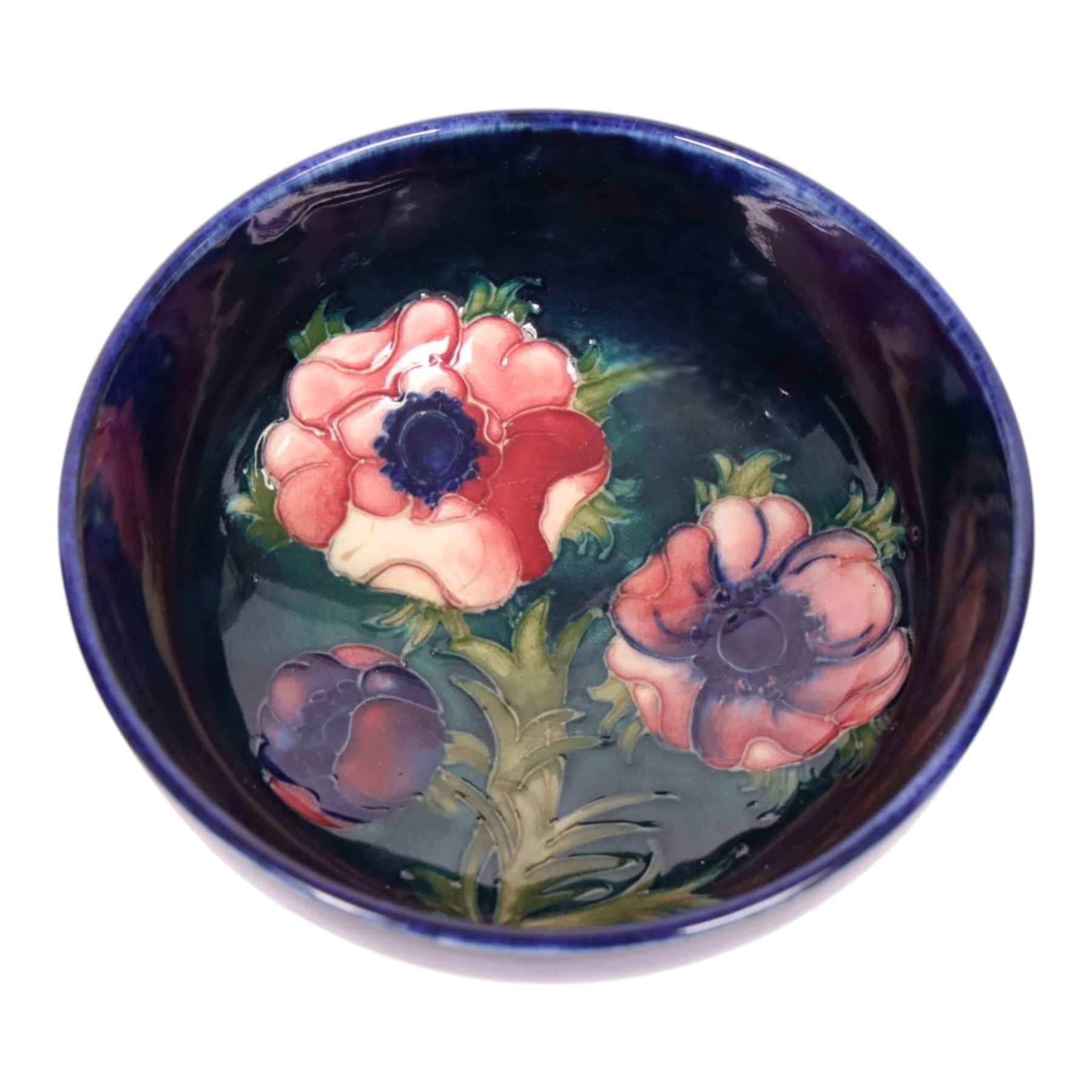 Two Moorcroft Amemnoe pattern bowls, together with a Anna Lily pattern dish, largest bowl D13cm